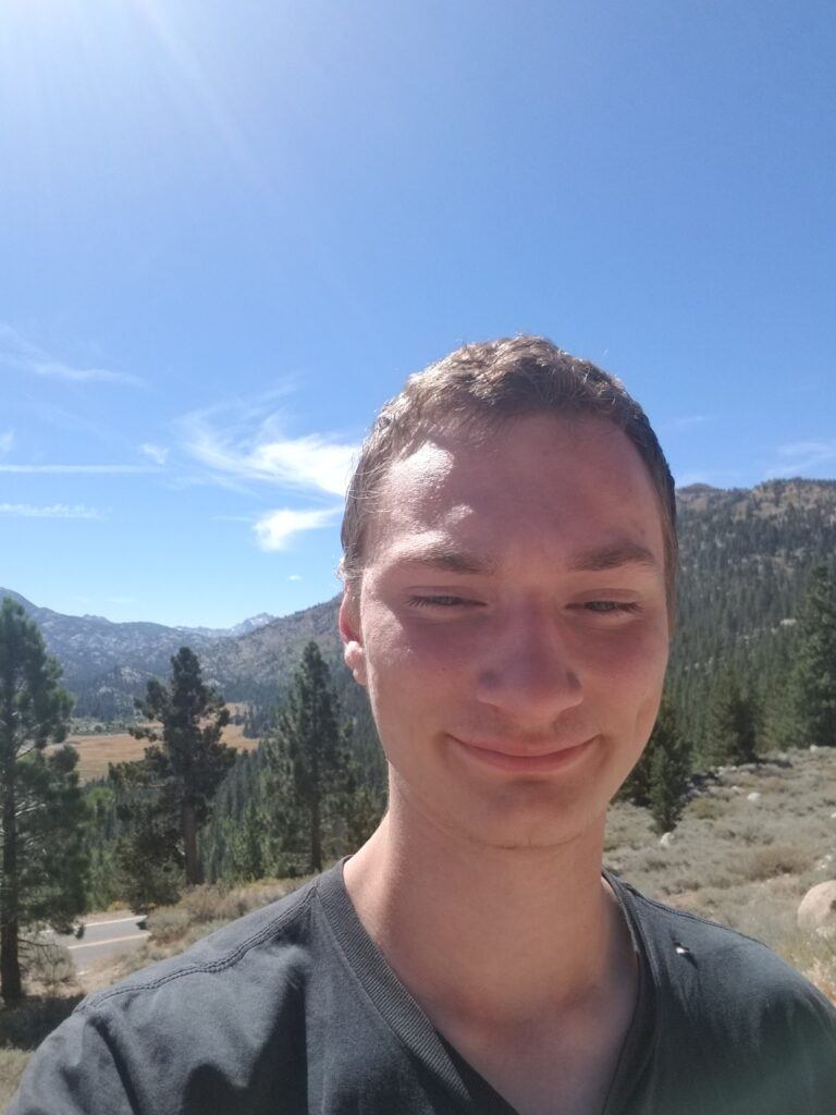 man hiking in the woods